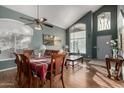 Bright dining room with hardwood floors and a large table at 1212 E Butler Dr, Chandler, AZ 85225