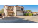 Two-story house with a two-car garage and desert landscaping at 18611 N 22Nd St # 2, Phoenix, AZ 85024