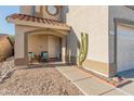 Inviting front entrance with a cozy seating area and desert landscaping at 18611 N 22Nd St # 2, Phoenix, AZ 85024