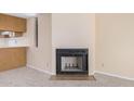 Cozy corner fireplace in living room at 2020 W Union Hills Dr # 201, Phoenix, AZ 85027