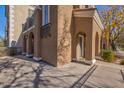 Front entrance of a charming home with arched entryway at 2638 S Harmony Ave, Gilbert, AZ 85295