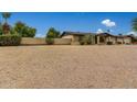 House exterior with gravel driveway and desert landscaping at 5530 N 47Th Ave, Glendale, AZ 85301