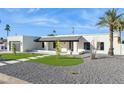 White house with a landscaped front yard and walkway at 9626 N 17Th Pl, Phoenix, AZ 85020