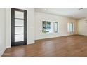 Bright living room with hardwood floors and large windows at 9626 N 17Th Pl, Phoenix, AZ 85020