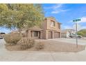House exterior view from across the street, showcasing landscaping and neighborhood context at 1036 E Oak Rd, San Tan Valley, AZ 85140