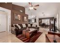 Bright and airy living room with an open floor plan and hardwood floors at 1350 W Seascape Dr, Gilbert, AZ 85233