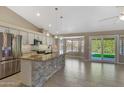 Updated kitchen with granite countertops and stainless steel appliances at 1656 E Montoya Ln, Phoenix, AZ 85024
