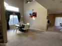 Bright dining room with high ceilings and large window at 2049 N Arbor Ln, Chandler, AZ 85225