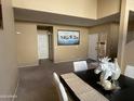 Spacious living room with high ceilings and neutral walls at 2049 N Arbor Ln, Chandler, AZ 85225
