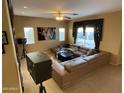 Large living room with sectional sofa and entertainment center at 2049 N Arbor Ln, Chandler, AZ 85225