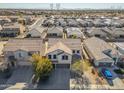Two-story house with a large backyard, located in a suburban neighborhood at 30313 W Mitchell Ave, Buckeye, AZ 85396