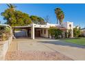 House with carport and a spacious front yard at 3126 E Monte Vista Rd, Phoenix, AZ 85008