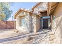 Home exterior showcasing entryway and landscaping at 4206 E Ellis Cir, Mesa, AZ 85205