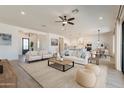 Spacious living area features neutral decor and an open floor plan at 27017 N 153Rd Dr, Surprise, AZ 85387