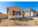 New construction home with a front yard and neutral color scheme at 31550 N Hayweather Ln, San Tan Valley, AZ 85143