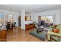 Open living area with dining space and modern kitchen at 14950 W Mountain View Blvd # 6301, Surprise, AZ 85374