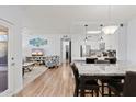 Open concept dining area with kitchen and living room views at 20100 N 78Th Pl # 2091, Scottsdale, AZ 85255