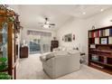 Living room features a fireplace, sliding door to patio, and built-in shelving at 2929 W Yorkshire Dr # 1060, Phoenix, AZ 85027