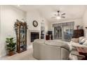 Bright living room with fireplace and access to patio at 2929 W Yorkshire Dr # 1060, Phoenix, AZ 85027