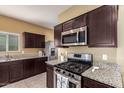 Modern kitchen with stainless steel appliances at 3641 N 309Th Dr, Buckeye, AZ 85396