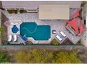 Luxury home with a private pool and expansive backyard, offering stunning mountain views at 4119 S Las Villa Way, Gold Canyon, AZ 85118