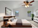 Large main bedroom with ceiling fan and ample natural light at 41876 W Corvalis Ln, Maricopa, AZ 85138