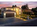 Elegant home with a three-car garage and a meticulously landscaped yard at 6237 N 5Th Pl, Phoenix, AZ 85012