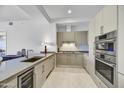 Contemporary kitchen featuring stainless steel appliances and sleek cabinetry at 7180 E Kierland Blvd # 1209, Scottsdale, AZ 85254