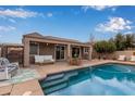 Inviting backyard oasis with a sparkling pool and patio at 2378 E Wisteria Dr, Chandler, AZ 85286