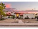 Charming single-story home featuring desert landscaping and a red tile roof at 3457 E Ellis St, Mesa, AZ 85213