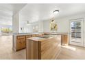 Kitchen with an island, wood cabinets, and stainless steel appliances at 5428 E El Sendero Dr, Cave Creek, AZ 85331