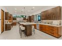 Gourmet kitchen featuring modern cabinetry, stainless steel appliances, and a large island at 5825 E Cochise Rd, Paradise Valley, AZ 85253