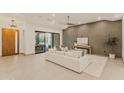 Bright and airy living room with a comfortable sofa and modern decor at 5825 E Cochise Rd, Paradise Valley, AZ 85253