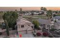 Stunning home aerial view, backing up to a golf course and community at 5951 W Irma Ln, Glendale, AZ 85308