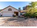 House exterior showcasing a front entrance and landscaping at 707 W Alamo Dr, Chandler, AZ 85225