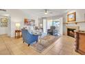 Spacious living room featuring fireplace and comfy seating at 7950 E Starlight Way # 220, Scottsdale, AZ 85250