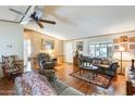 Spacious living room featuring hardwood floors and comfortable seating at 11596 W Sierra Dawn Blvd # 134, Surprise, AZ 85378