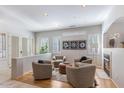 Bright living room with fireplace and comfortable seating area at 15720 E Yucca Dr, Fountain Hills, AZ 85268