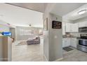 Open kitchen with granite countertops and stainless steel appliances at 1976 S 172Nd Ln, Goodyear, AZ 85338