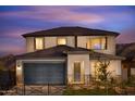 Two-story house with a gray garage door and a landscaped front yard at 20631 N 226Th Ln, Surprise, AZ 85387