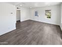 Spacious living area with gray tile flooring at 309 E Weldon Ave, Phoenix, AZ 85012