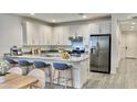 Modern kitchen with stainless steel appliances and an island at 2033 W Burnside Trl, Phoenix, AZ 85085