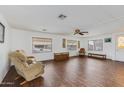 Spacious living room with wood flooring and comfy seating at 305 S Val Vista Dr # 417, Mesa, AZ 85204