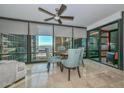Modern dining area with city views and access to a balcony at 4808 N 24Th St # 1123, Phoenix, AZ 85016
