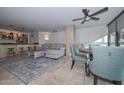 Open concept living and dining space with city views at 4808 N 24Th St # 1123, Phoenix, AZ 85016
