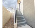 Stairs leading to the entrance of a modern home at 6850 E Mcdowell Rd # 7, Scottsdale, AZ 85257
