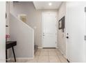 Clean entryway featuring a staircase and storage at 750 W Flintlock Way, Chandler, AZ 85286