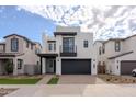 Stunning two-story home with clean lines and a modern facade at 10249 E Ulysses Ave, Mesa, AZ 85212
