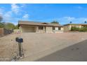 Front view of single story home with driveway at 17112 E La Pasada Dr, Fountain Hills, AZ 85268