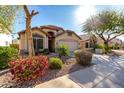 House exterior showcasing curb appeal and landscaping at 22421 N 19Th Way, Phoenix, AZ 85024